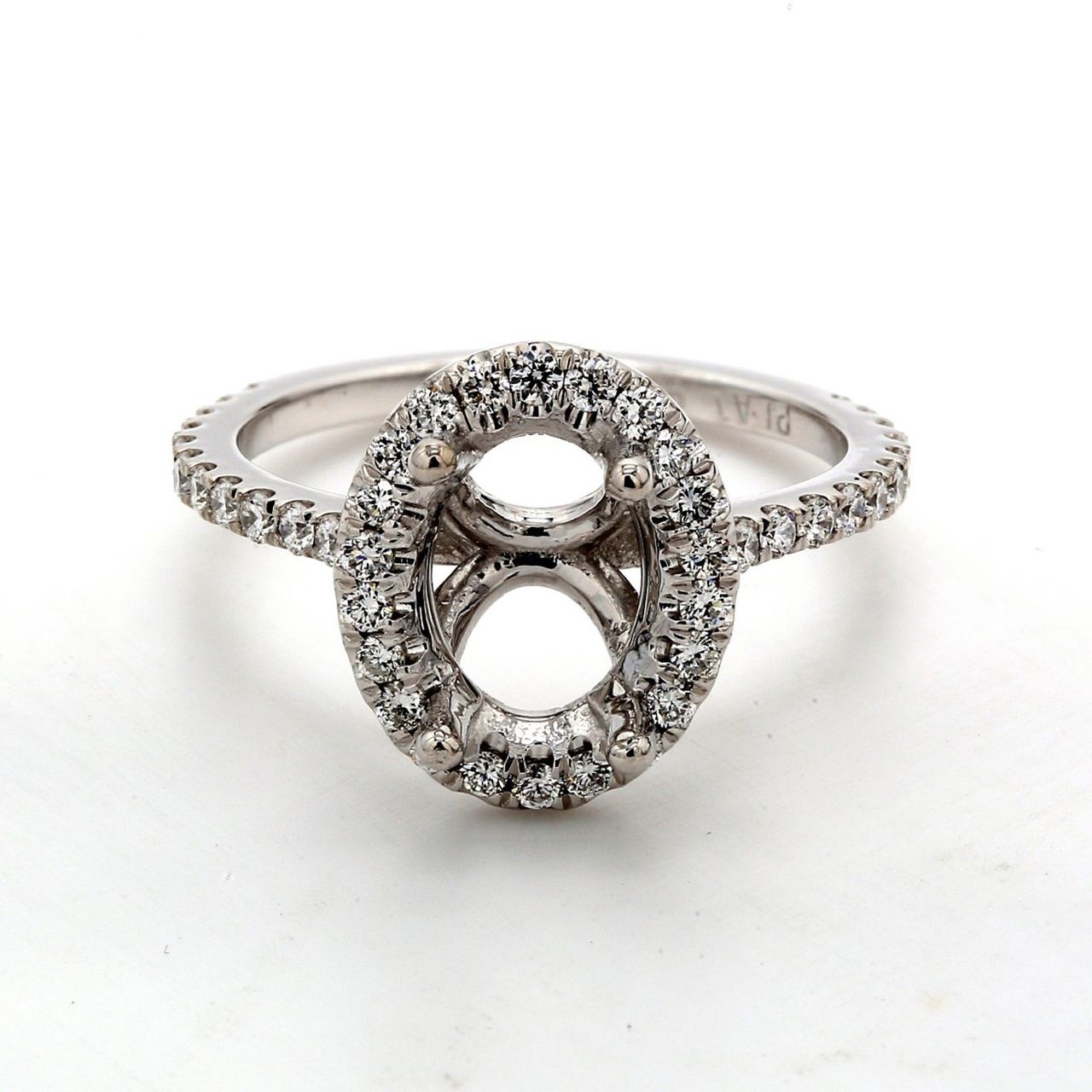 Halo semi-mount with U-prong set round diamonds.  D0.41ct.t.w.  Size 6.75