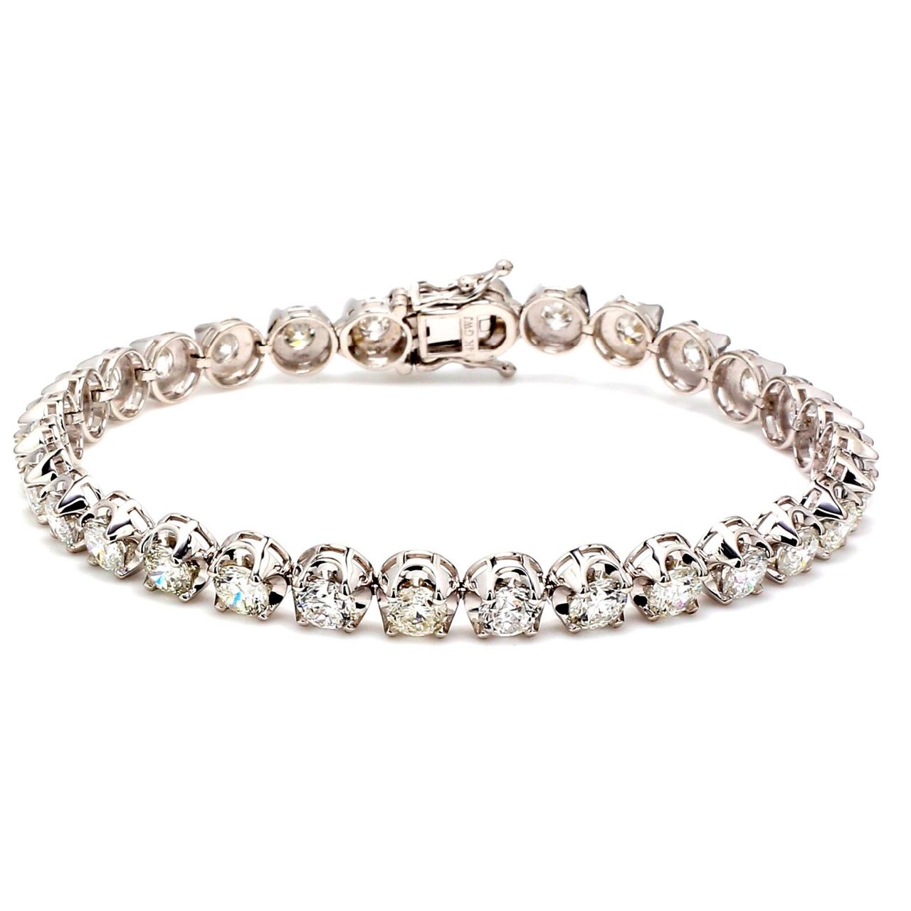 7.5' Tennis bracelet with crown head prong set (30) round diamonds.  D9.36ct.t.w.