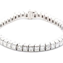 7' Tennis bracelet with channel set princess cut diamonds.  D6.19ct.t.w.