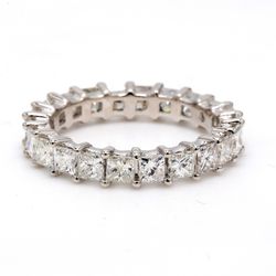Eternity band with shared prong set (22) princess cut diamonds.  D2.99ct.t.w.  Size 6.75