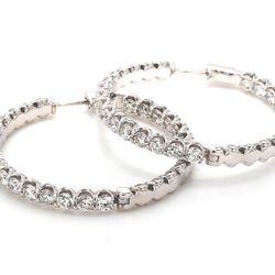 1.50' Inside out hoop earrings with U-prong set round diamonds.  D9.52ct.t.w.