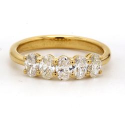 5-stone band in 18K YG with basket shared prong set oval cut diamonds.  D1.03ct.t.w.  Size 6