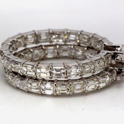 1' Inside out hoop earrings in 18K WG with prong set (38) emerald cut diamonds.  D7.14ct.t.w.