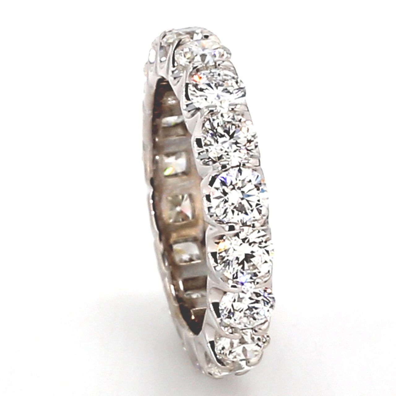 Eternity band in platinum with U-prong set (18) round diamonds.  D3.32ct.t.w.  Size 5.75