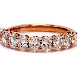 9-stone band in 18K RG with basket prong set oval cut diamonds.  D1.66ct.t.w.  Size 7.5