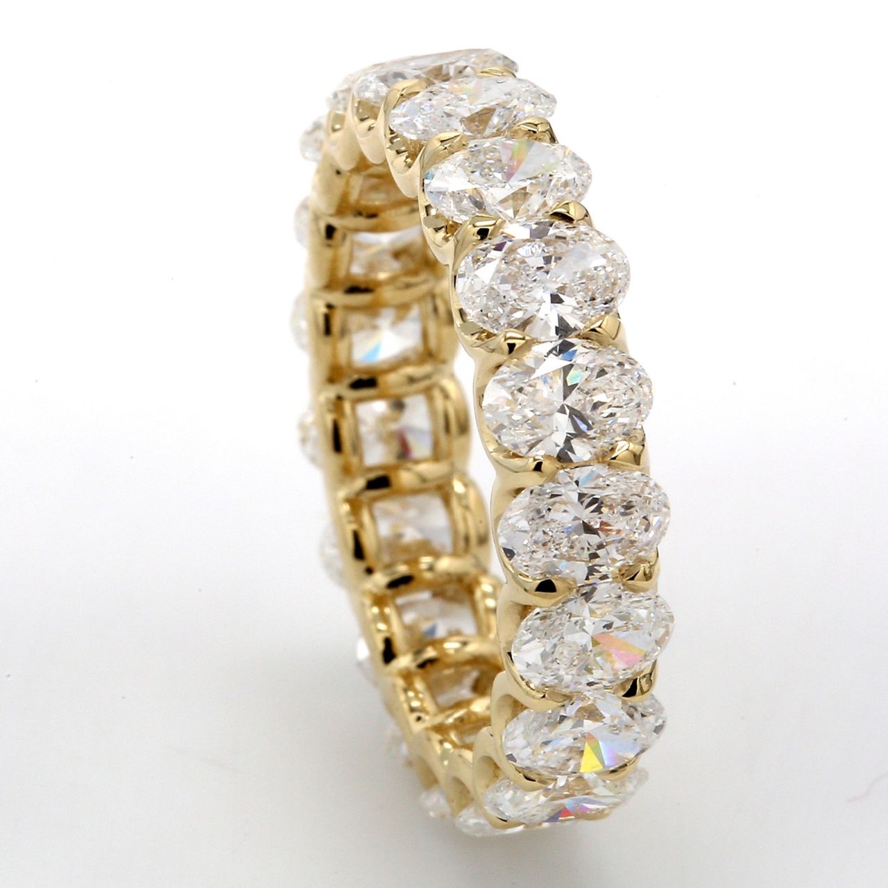 Eternity band with U-prong set (22) oval diamonds.  D2.95ct.t.w.  Size 6