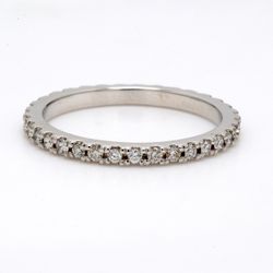 Eternity band with shared U-prong set (35) round diamonds.  D0.41ct.t.w.  Size 6.25