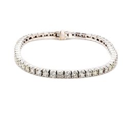 7' Tennis bracelet with prong set (52) round diamonds.  D5.85ct.t.w.