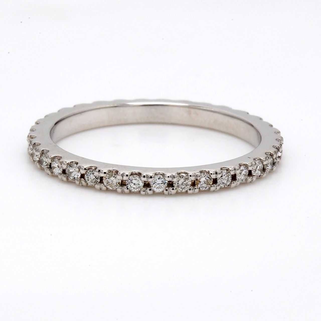 Eternity band with shared U-prong set (35) round diamonds.  D0.41ct.t.w.  Size 6.25