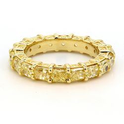 Eternity band in 18K YG with 4-prong set (18) fancy yellow radiant cut diamonds.  D4.45ct.t.w.  Size 6.25