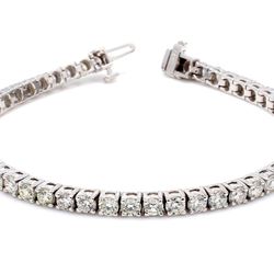 7' Tennis bracelet with 4-prong set (77) round diamonds.  D3.07ct.t.w.