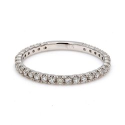 Band with 4-prong set (31) round diamonds.  D0.37ct.t.w.  Size 6.75