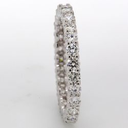 Eternity band in 18K WG with U-prong set (27) round diamonds.  D1.19ct.t.w.  Size 5.75