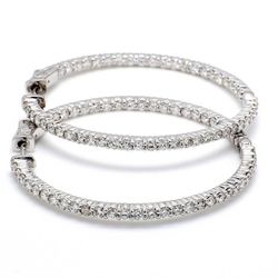 1' Inside out hoop earrings with shared prong set (40) round diamonds & with special spring lock.  D2.02ct.t.w.