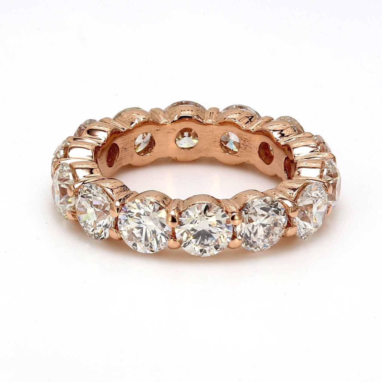 Eternity band in 18K RG with shared prong set round diamonds.  D4.63ct.t.w.