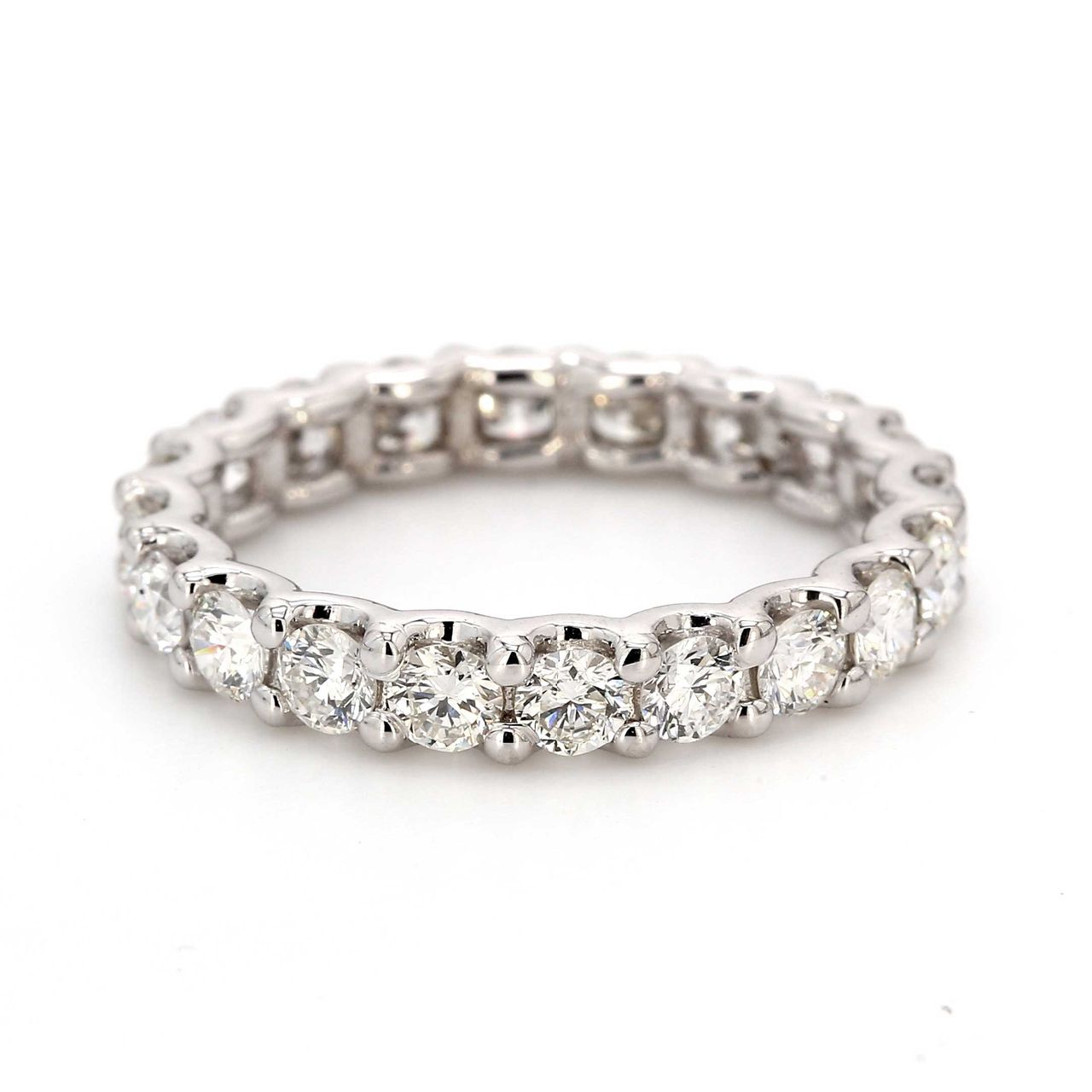 Eternity band with shared 4-prong set (21) round diamonds.  D1.87ct.t.w.  Size 6