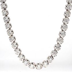 17' Tennis necklace in 18K WG with illusion crown head 4-prong set (74) round diamonds.  D22.60ct.t.w.