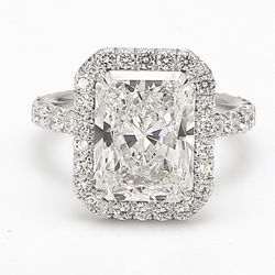 Halo semi-mount in platinum with round diamonds.  D1.00ct.t.w.