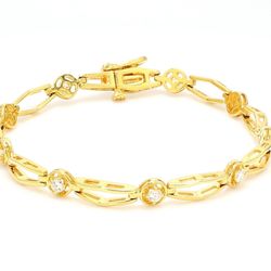 7' Bracelet in 18K YG with 4-prong set round diamonds.  D0.60ct.t.w.
