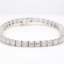 7' Tennis bracelet east to west style in platinum with double basket prong set radiant cut diamonds.  D10.52ct.t.w.