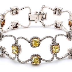 7' Designer bracelet with rounds, princess cuts, & fancy yellow cushion diamond centers.  D12.91ct.t.w.  Fancy Yellow 6.05ct.t.w.