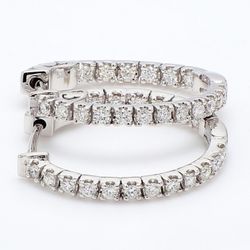 0.75' Inside out hoop earrings with 4-prong set (34) round diamonds & with special spring lock.  D1.14ct.t.w.
