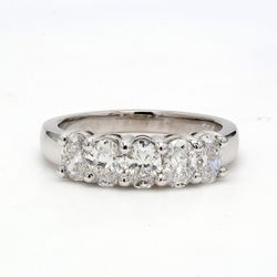 5-stone band in platinum with shared prong set oval cut diamonds.  D1.44ct.t.w.  Size 7