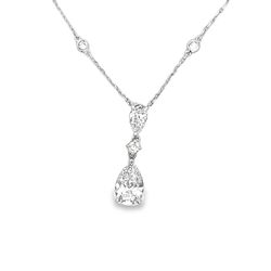 18' Diamonds by the yard drop necklace in 18K WG with bezel set (10) rounds and drop set GIA certified D/SI2-I1 pear shape diamonds.   D2.96ct.t.w.