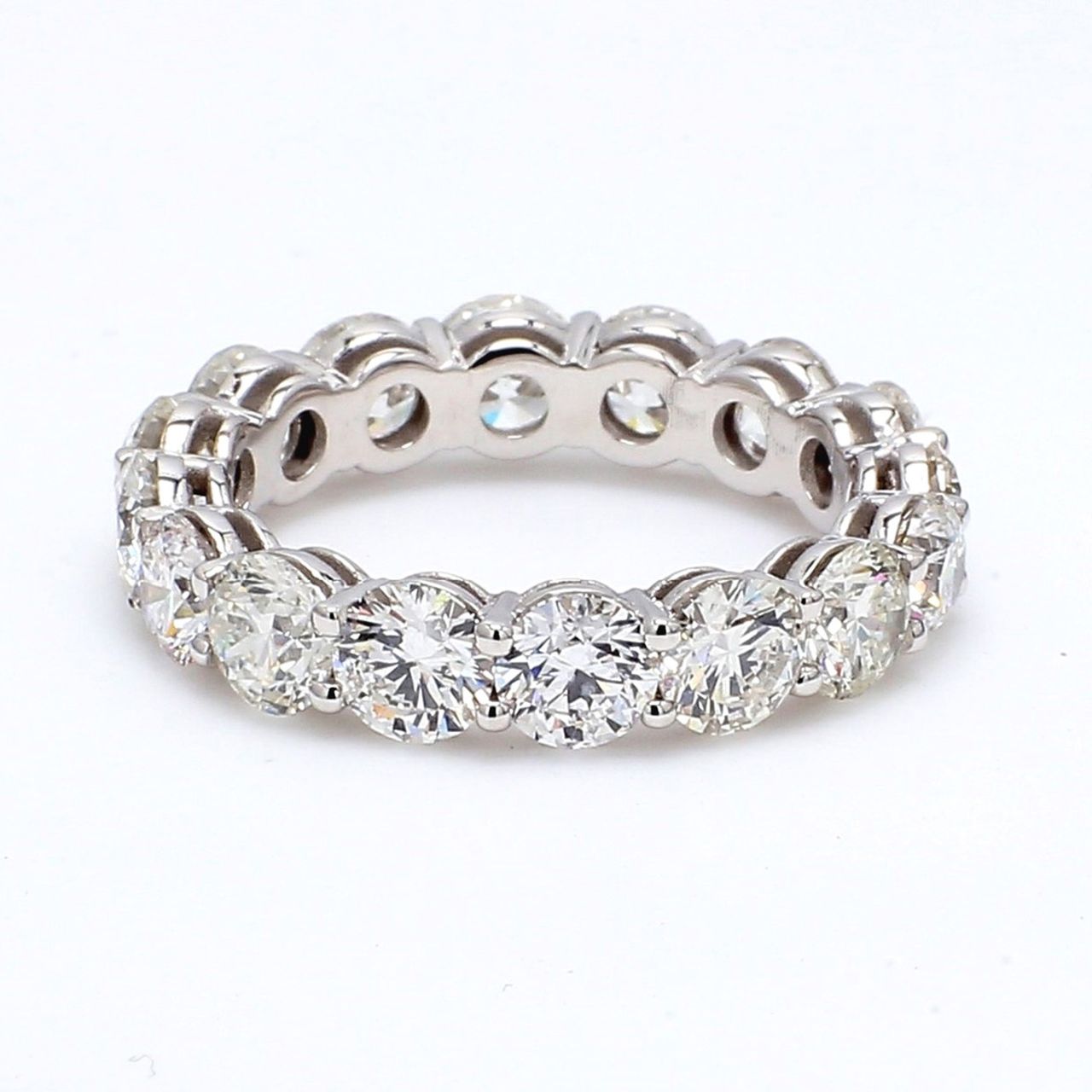 Eternity band with shared prong set round diamonds.  D5.26ct.t.w.