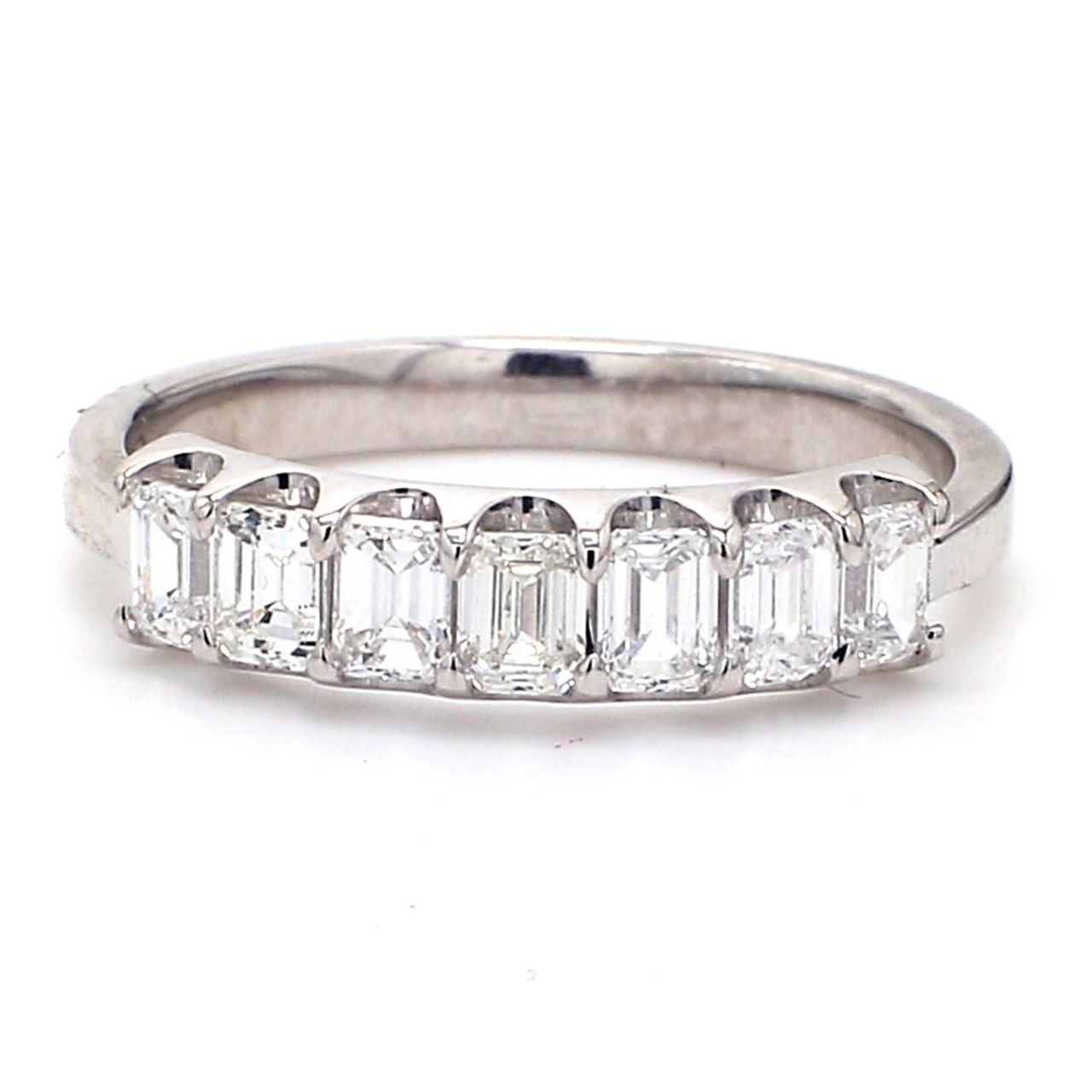 7-stone band in platinum with U-prong set emerald cut diamonds.  D0.87ct.t.w.
