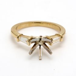 Three Stone semi-mount in 18K YG with tapered baguette diamond sides.  D0.33ct.t.w.  Size 6