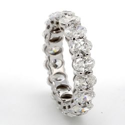 Eternity band in 18K WG with basket prong set (18) oval diamonds.  D2.84ct.t.w.  Size 5