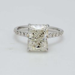 Halo semi-mount in 18K WG with french pave set round diamonds.  D0.32ct.t.w.  Size 5