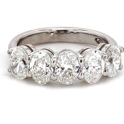 5-stone band in platinum with basket prong set GIA certified D-F/SI1-SI2 oval diamonds.  D2.50ct.t.w.  Size 5.75
