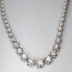 17' Graduated tennis necklace in 18K WG with U-prong set (102) round diamonds.  D15.74ct.t.w.