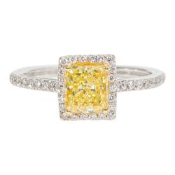 Halo ring with French pave set roundds around 4-prong set GIA certified FY/SI1 radiant cut diamond center stone.  D1.30ct.t.w.  (Center 1.05ct.)