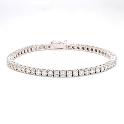 7' Tennis bracelet in 18K WG with 4-prong set (55) round diamonds.  D6.05ct.t.w.