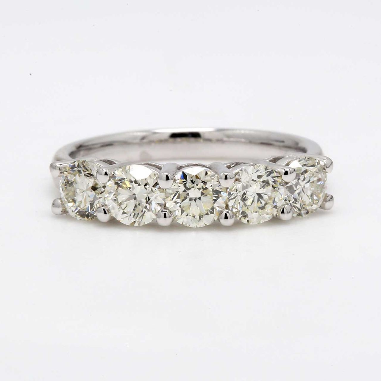 5 stone band with shared prong set round diamonds.  D1.87ct.t.w.  Size 6.75