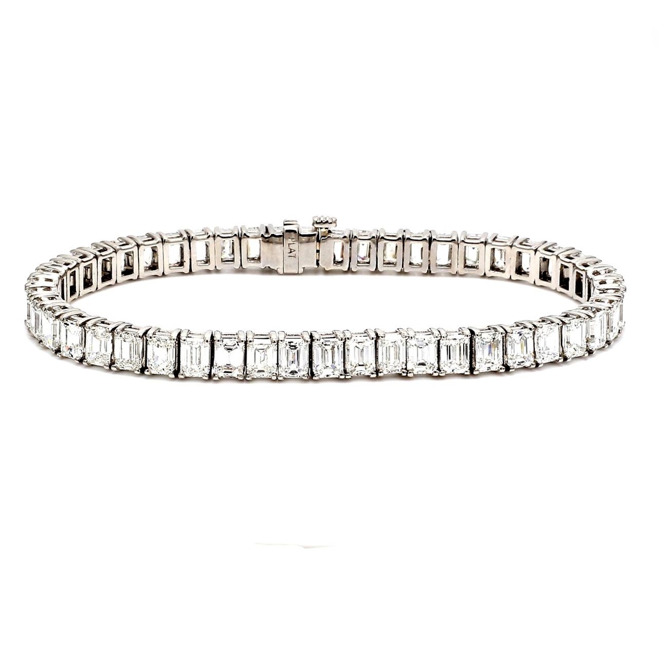 7' Tennis bracelet in platinum with 4-prong set (49) emerald cut diamonds.  D15.30ct.t.w.