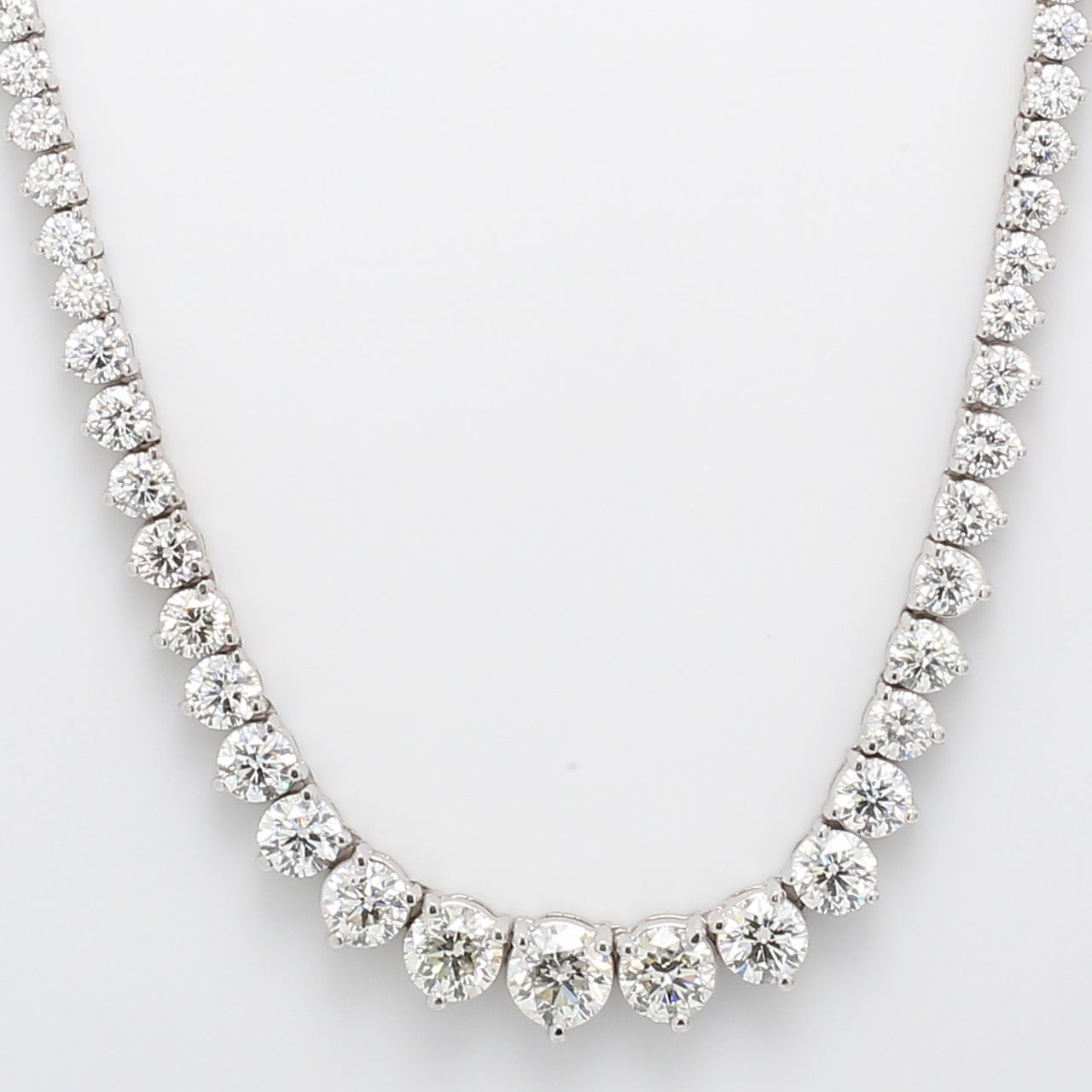 Graduated tennis necklace with 3-prong set round diamonds.  D12.44ct.t.w.