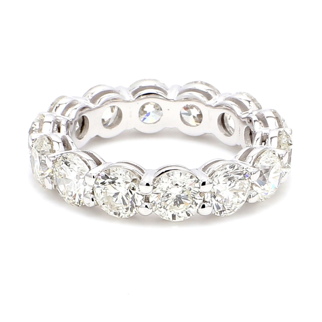 Eternity band with shared 4-prong set (14) round diamonds.  D6.52ct.t.w.  Size 6