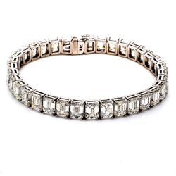 7' Tennis bracelet with basket 4-prong set (57) emerald cut diamonds.  D13.09ct.t.w.