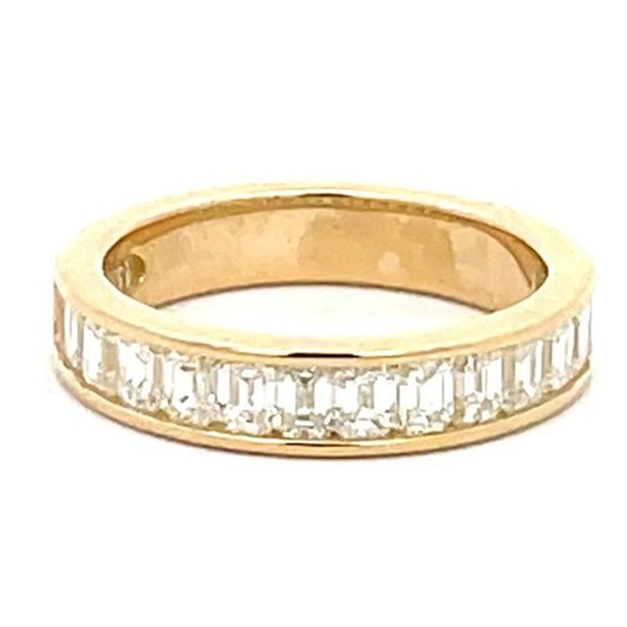 Single row band in 18K YG with channel set (15) emerald cut diamonds.  D1.23ct.t.w.  Size 5