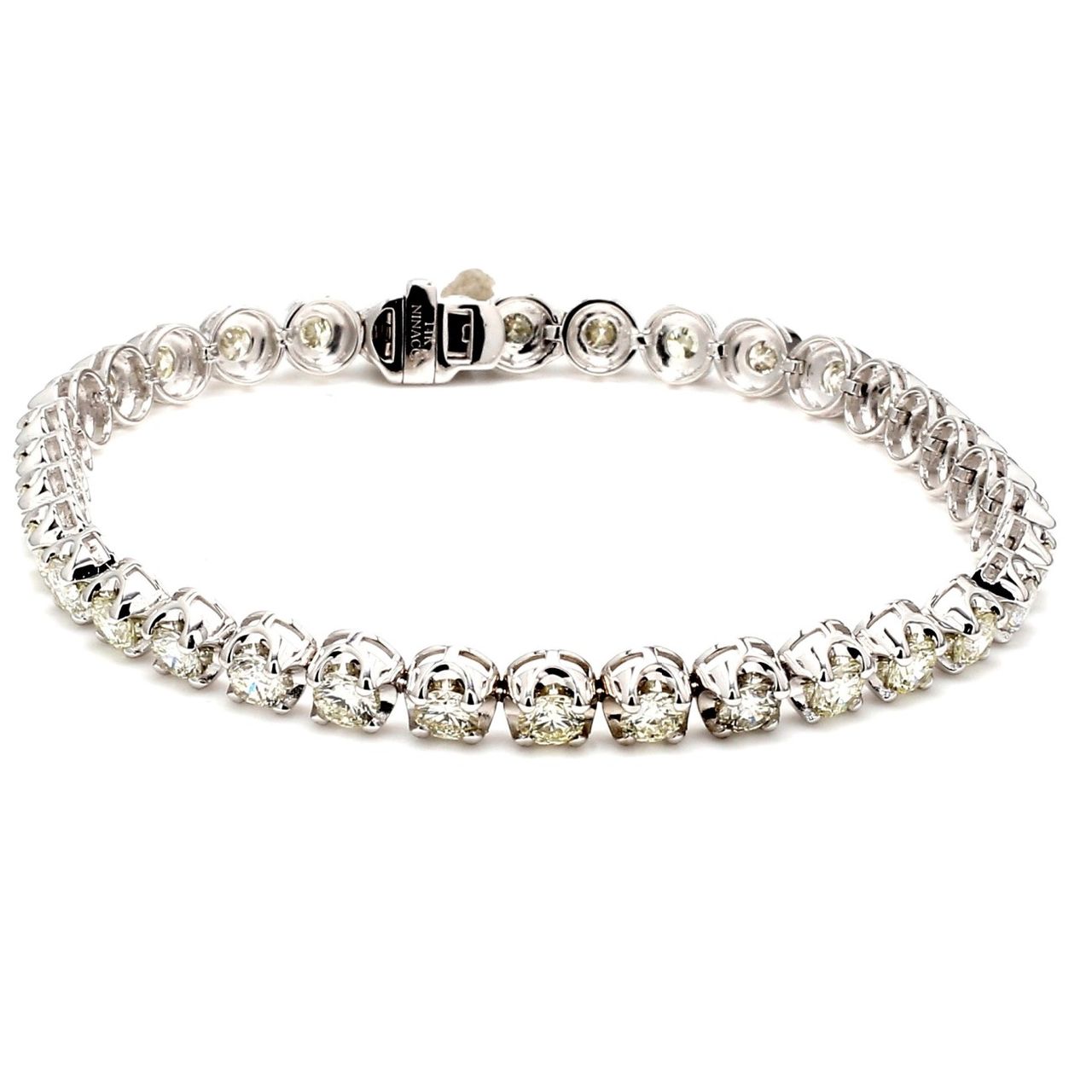 7' Tennis bracelet with crown head prong set (34) round diamonds.  D6.27ct.t.w.