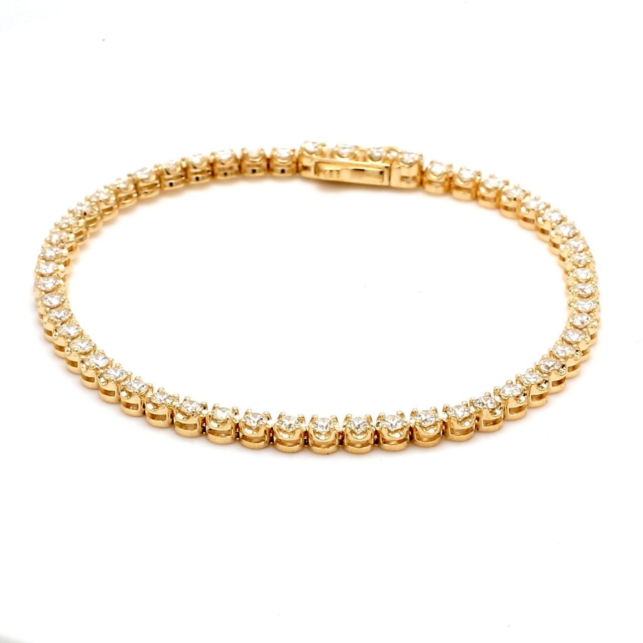 7' Tennis bracelet with crown head prong set (54) round diamonds.  D7.68ct.t.w.