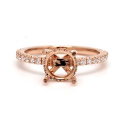 Hidden halo semi-mount with french pave set round diamonds.  D0.56ct.t.w.