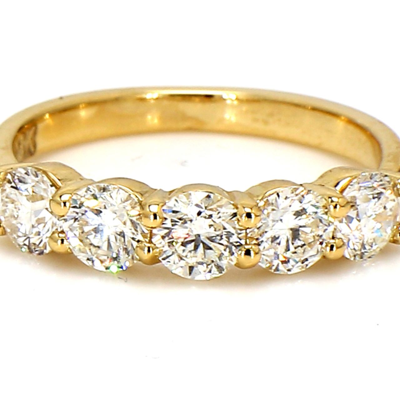 5-stone band in 18K YG with basket prong set round diamonds.  D1.32ct.t.w.  Size 6
