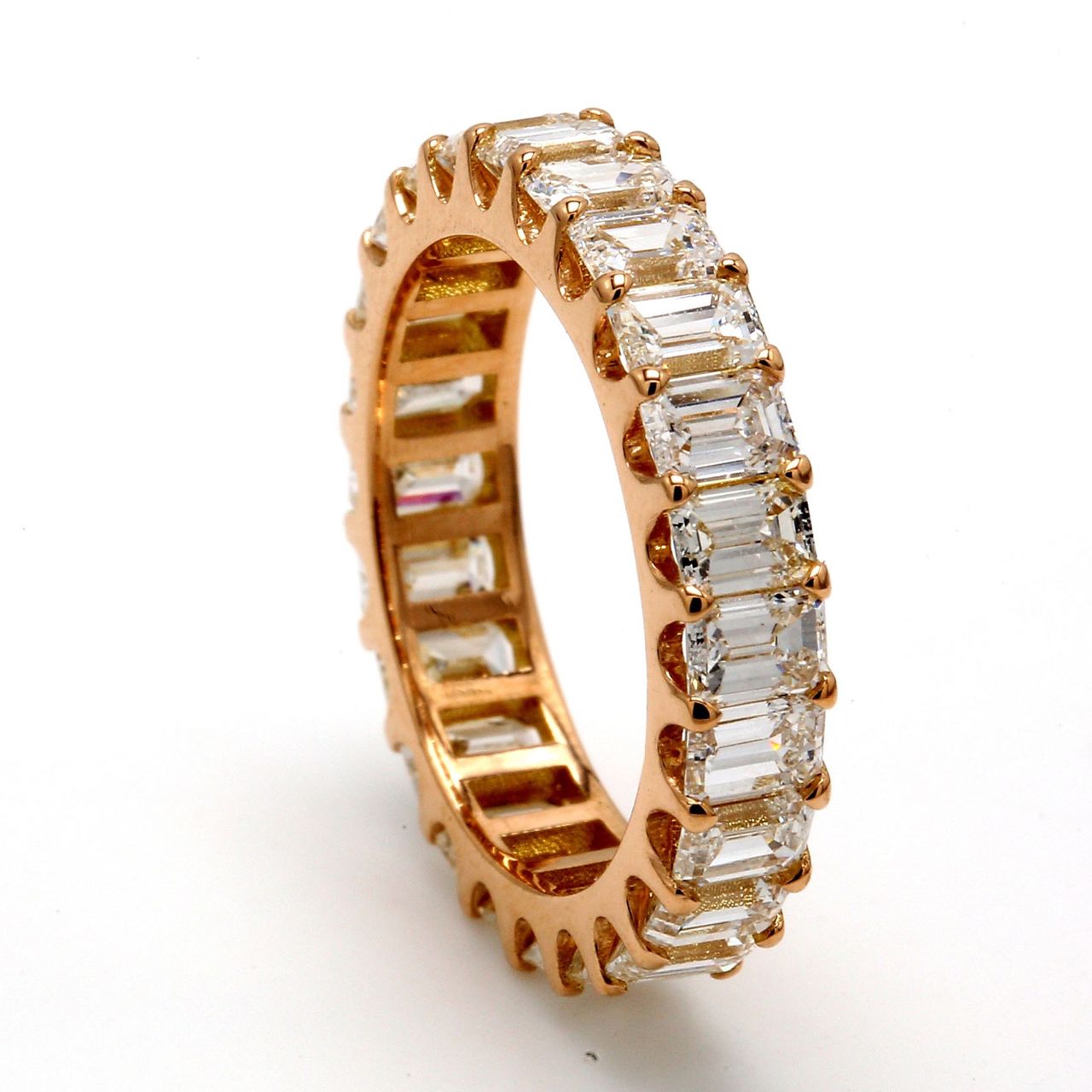 Eternity band in 18K RG with U-prong set (24) emerald cut diamonds.  D3.46ct.t.w.  Size 5