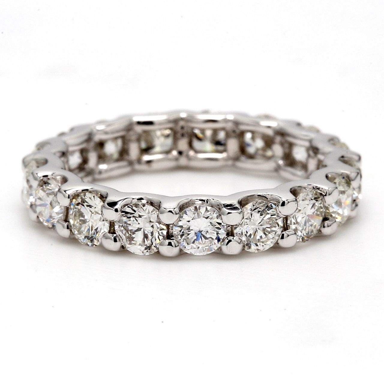 Eternity band with U-prong set round diamonds.  D3.09ct.t.w.
