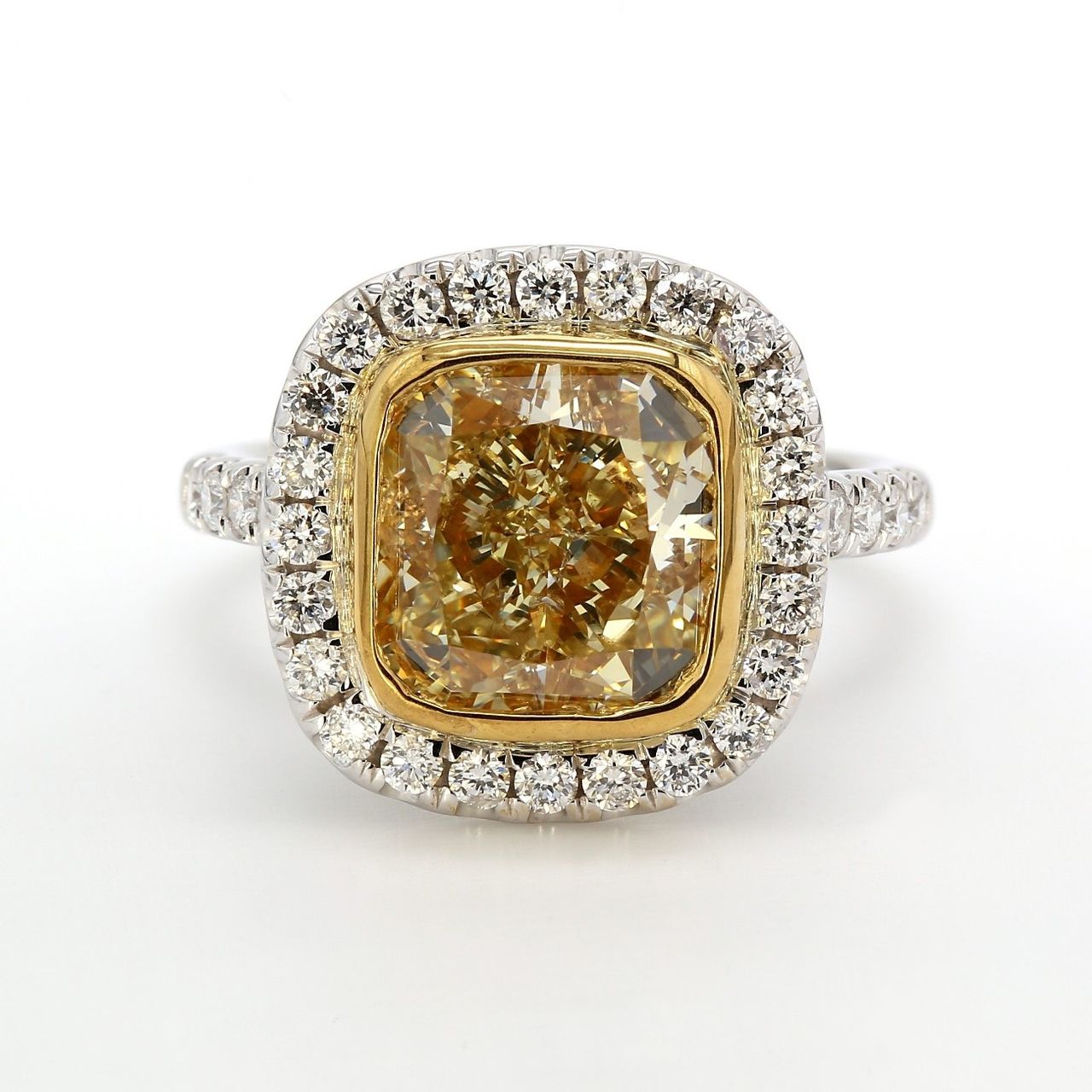 Halo semi-mount in 18K WG with prong set round diamonds.  D0.84ct.t.w.